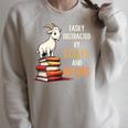 Easily Distracted By Goats And Books Goats And Book Reading Raglan Sleeve Sweatshirt Heather Forest