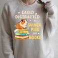 Easily Distracted By GUINEA PIGS And Books Raglan Sleeve Sweatshirt Heather Forest