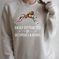 Easily Distracted By Octopuses & Books Lover Mollusc Raglan Sleeve Sweatshirt Heather Forest Easily Distracted By Octopuses & Books Lover Mollusc Raglan Sleeve Sweatshirt Heather Forest