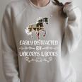 Easily Distracted By Unicorns And Books Raglan Sleeve Sweatshirt Heather Forest
