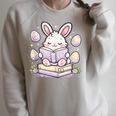 Easter Bunny Reading Book Cute Pastel Eggs Raglan Sleeve Sweatshirt Heather Forest Easter Bunny Reading Book Cute Pastel Eggs Raglan Sleeve Sweatshirt Heather Forest