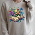 Enchanted Open Book With Blooming Flowers Raglan Sleeve Sweatshirt Heather Forest