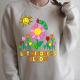 Eric Carle Let Kindness Bloom Flowers And Caterpillar Book Raglan Sleeve Sweatshirt Heather Forest