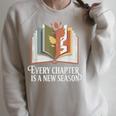 Every Chapter Is A New Season Autumn Book Lover Raglan Sleeve Sweatshirt Heather Forest