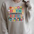 Everyone Communicates Differently Book Kids Teacher Raglan Sleeve Sweatshirt Heather Forest