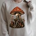 Floral Mushroom Skeleton Reading Books Gothic Humor Raglan Sleeve Sweatshirt Heather Forest