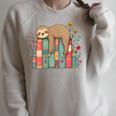 Floral Sloth Sleeping On Books Raglan Sleeve Sweatshirt Heather Forest