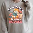 My Weekend Is Fully Booked Cute Cat Book Lover Dad Joke Raglan Sleeve Sweatshirt Heather Forest