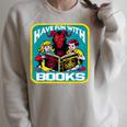 Have Fun With Books Sarcastic Occult Retro Comic Dark Humor Raglan Sleeve Sweatshirt Heather Forest