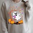 Ghost Reading Book On Swing Halloween Autumn Art Raglan Sleeve Sweatshirt Heather Forest