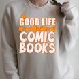 A Good Life Is A Collection Of Comic Books Graphic Vintage Raglan Sleeve Sweatshirt Heather Forest