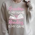 Grandma Is My Name Reading Is My Game Book Lover Raglan Sleeve Sweatshirt Heather Forest Grandma Is My Name Reading Is My Game Book Lover Raglan Sleeve Sweatshirt Heather Forest