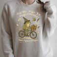 On My Way To Hoard Books And Cause Chaos Tom Foolery Frog Raglan Sleeve Sweatshirt Heather Forest