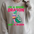 I'm A Book Dragon Not A Worm Books Reading Quotes Fun Raglan Sleeve Sweatshirt Heather Forest I'm A Book Dragon Not A Worm Books Reading Quotes Fun Raglan Sleeve Sweatshirt Heather Forest