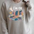 I'm OK Books Pile Books Stack Bibliophile Bookisk Raglan Sleeve Sweatshirt Heather Forest