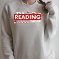 It's a Reading Thing Book Lover Literature Student Reader Premium Tri-Blend Raglan Sleeve Sweatshirt Heather Forest
