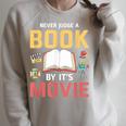 Never Judge A Book By It's Movie Reading Raglan Sleeve Sweatshirt Heather Forest