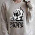 Just One More Chapter Book Skeleton Reading Books Raglan Sleeve Sweatshirt Heather Forest