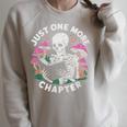 Just One More Chapter Mushrooms Gothic Skeleton Book Lover Premium Raglan Sleeve Sweatshirt Heather Forest