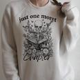 Just One More Chapter Vintage Floral Skeleton Reading Book Raglan Sleeve Sweatshirt Heather Forest