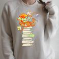 Kawaii Octopus Bookworm Fun Reading Tee For Book Lovers Premium Tri-Blend Raglan Sleeve Sweatshirt Heather Forest