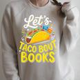 Let's Taco About Books Mexican Pun Bookworm Raglan Sleeve Sweatshirt Heather Forest