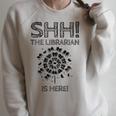 The Librarian Is Here Library Book Reading Books Bibliophile Raglan Sleeve Sweatshirt Heather Forest The Librarian Is Here Library Book Reading Books Bibliophile Raglan Sleeve Sweatshirt Heather Forest