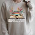 Library Assistant Messy Bun Library Book Reader Raglan Sleeve Sweatshirt Heather Forest