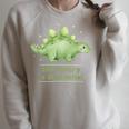 The Library Is Dino-Mite Stegosaurus Reading Kids Book Raglan Sleeve Sweatshirt Heather Forest