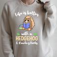 Life Is Better With A Hedgehog And Reading Books Raglan Sleeve Sweatshirt Heather Forest