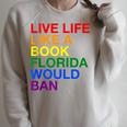Live Life Like A Book Florida Would Ban Pride Slogan Raglan Sleeve Sweatshirt Heather Forest