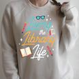 Living The Library Life Lover Sayings Books Librarian Raglan Sleeve Sweatshirt Heather Forest Living The Library Life Lover Sayings Books Librarian Raglan Sleeve Sweatshirt Heather Forest