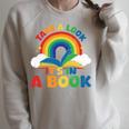 Take a Look It's In a Book Rainbow Reading Raglan Sleeve Sweatshirt Heather Forest