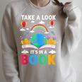 Take A Look It's In A Book Reading Vintage Retro Rainbow Raglan Sleeve Sweatshirt Heather Forest