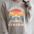 Take a Look It’s In a Book Vintage Sunset Mountain Reading Raglan Sleeve Sweatshirt Heather Forest Take a Look It’s In a Book Vintage Sunset Mountain Reading Raglan Sleeve Sweatshirt Heather Forest