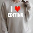 I Love Editing Heart Movie Film Newspaper Journalism Book Raglan Sleeve Sweatshirt Heather Forest