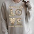 Love Unearth a Story Summer Reading 2026 Dino Skeleton Book Raglan Sleeve Sweatshirt Heather Forest Love Unearth a Story Summer Reading 2026 Dino Skeleton Book Raglan Sleeve Sweatshirt Heather Forest