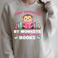 Monkeys And Books Saying With Book And Monkey Raglan Sleeve Sweatshirt Heather Forest Monkeys And Books Saying With Book And Monkey Raglan Sleeve Sweatshirt Heather Forest