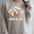 All I Need Is Book & Cat Book Lovers Cat Owners Humour Raglan Sleeve Sweatshirt Heather Forest