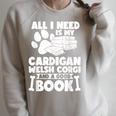 All i Need Is My Cardigan Welsh Corgi And a Good Book Raglan Sleeve Sweatshirt Heather Forest