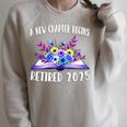 A New Chapter Begins Retired 2025 Floral Book Retirement Raglan Sleeve Sweatshirt Heather Forest A New Chapter Begins Retired 2025 Floral Book Retirement Raglan Sleeve Sweatshirt Heather Forest