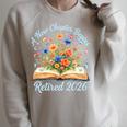 New Chapter Begins Retired 2026 Watercolor Floral Book Women Premium Tri-Blend Raglan Sleeve Sweatshirt Heather Forest