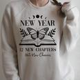 New Year 2026 Reading Book 12 New Chapters 365 New Chances Raglan Sleeve Sweatshirt Heather Forest New Year 2026 Reading Book 12 New Chapters 365 New Chances Raglan Sleeve Sweatshirt Heather Forest