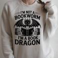 Im Not A Bookworm Im A Book Dragon Fantasy Raglan Sleeve Sweatshirt Heather Forest