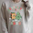 Oh What Fun It Is To Read Christmas Tree Book Lover Groovy Raglan Sleeve Sweatshirt Heather Forest