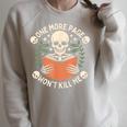 One More Page Won't Kill Me Reading Skeleton Read Book Raglan Sleeve Sweatshirt Heather Forest