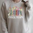 Physical Therapy Floral Book Easter PT Physical Therapist Raglan Sleeve Sweatshirt Heather Forest