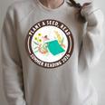 Plant A Seed Read Summer Reading 2026 Library Program Book Raglan Sleeve Sweatshirt Heather Forest Plant A Seed Read Summer Reading 2026 Library Program Book Raglan Sleeve Sweatshirt Heather Forest