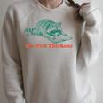 The Plot Thickens Bookish Raccoon Fantasy Book Reader Raglan Sleeve Sweatshirt Heather Forest
