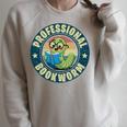 Professional Bookworm Bookish Book Nerd For Women Men Premium Tri-Blend Raglan Sleeve Sweatshirt Heather Forest